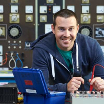 Electrician with a circuit board