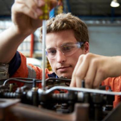 Mechanic working on an engine