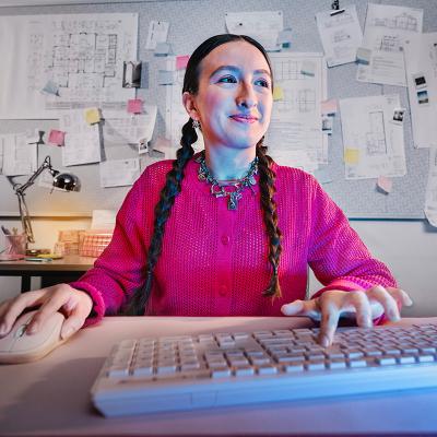 student sitting in front of PC screen