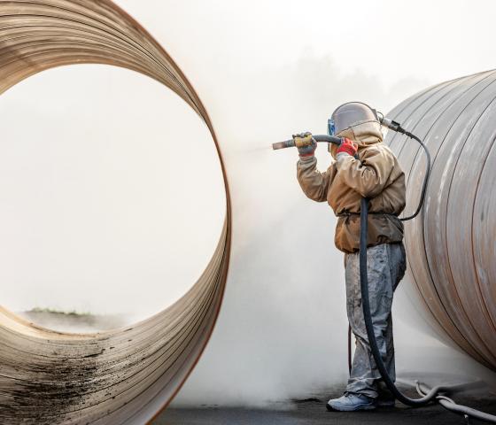 Close up view of sandblasting before coating