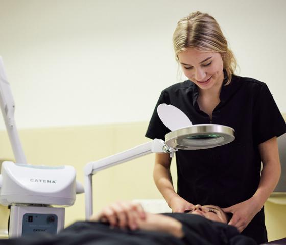 person applying beauty treatment