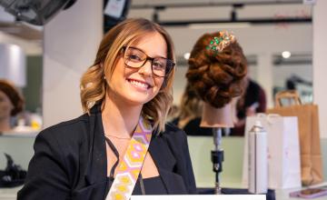 Hairdressing student Larni at the Worldskills competition with her up do style