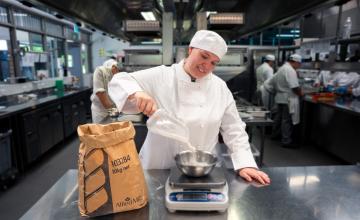 Patisserie student Hayley measuring flour 