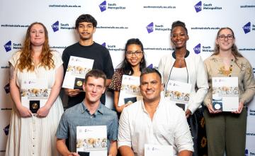 Seven 2026 Student Awards winners holding medals and certificates