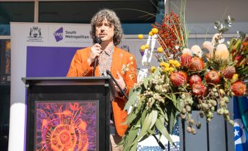 Frank Mitchell speaking at the 2026 NAIDOC event.
